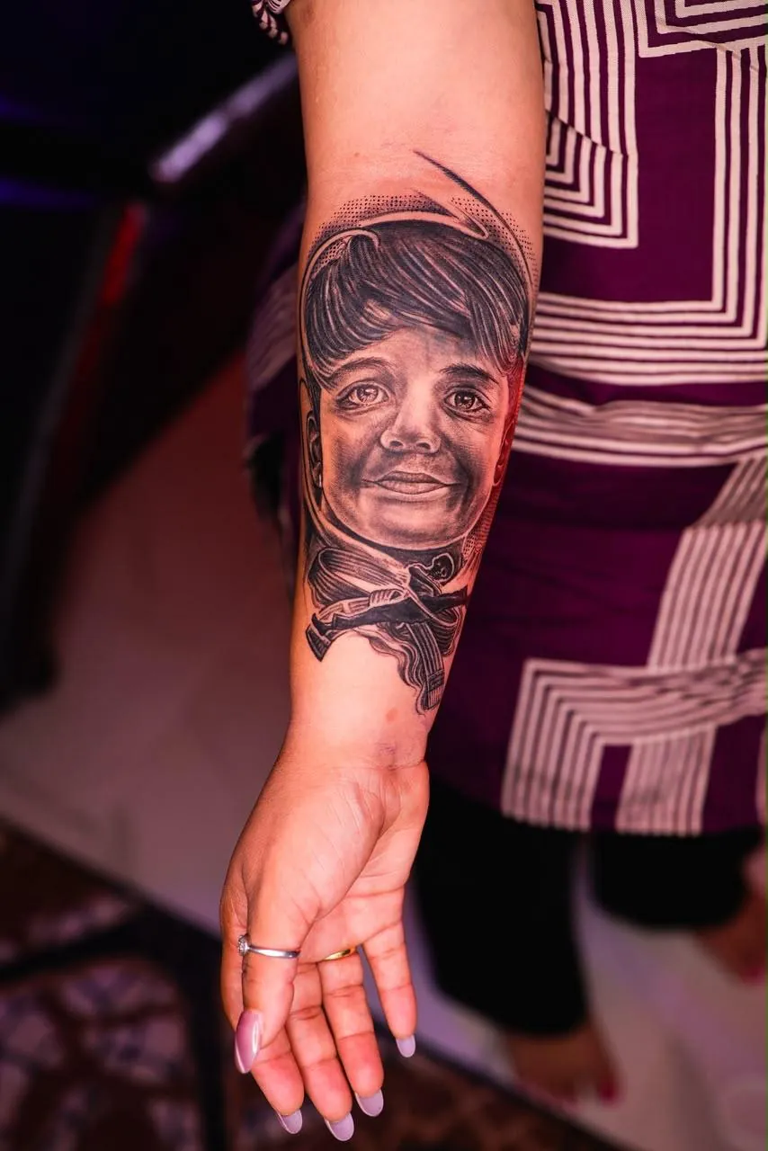 Detailed black and grey realistic portrait tattoo by Alibaba Tattoos Mumbai